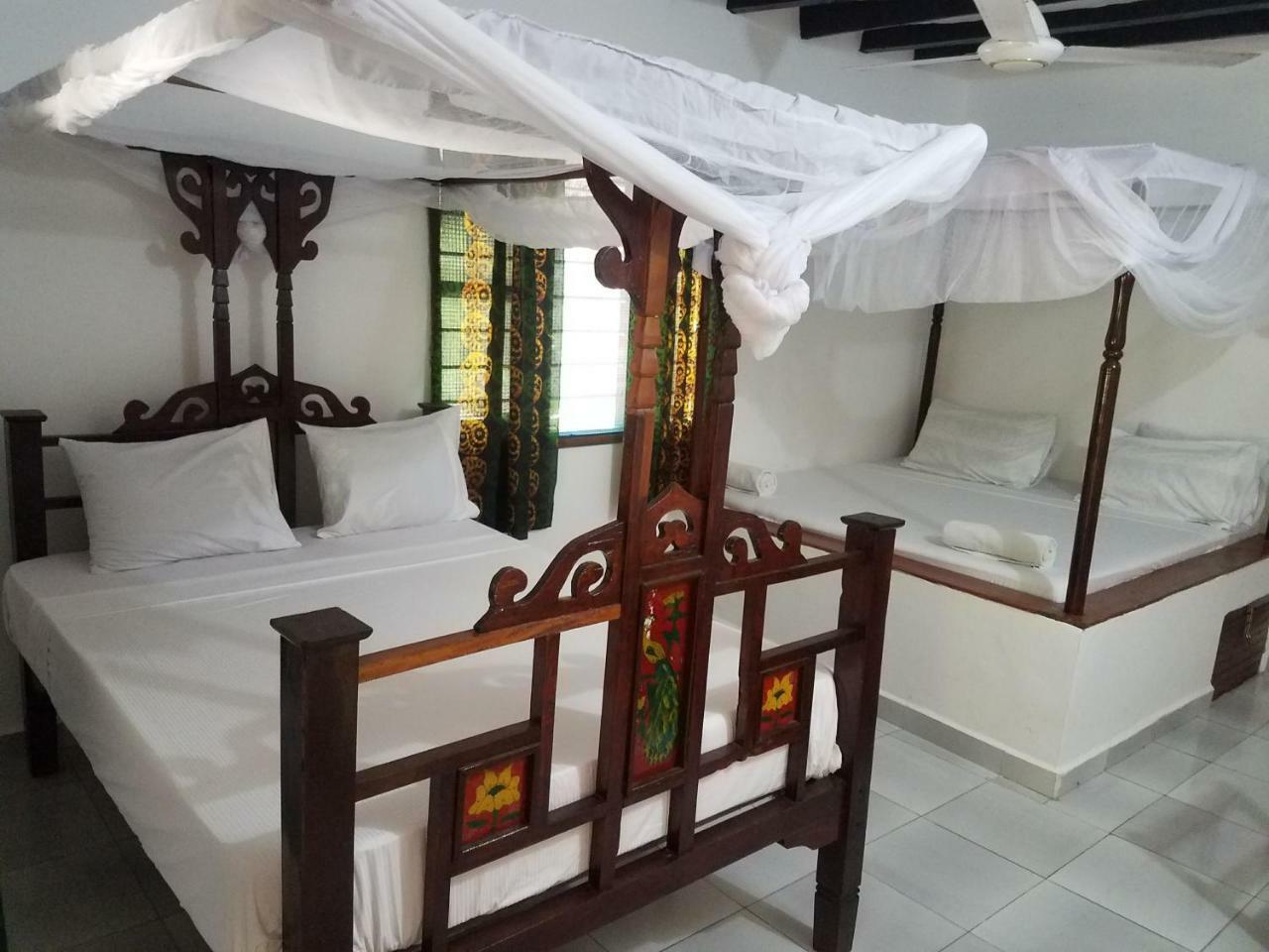 Baraka Aquarium Bungalows Нунгви Экстерьер фото